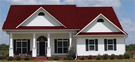 white house with burgundy metal porch roof|white house exterior.